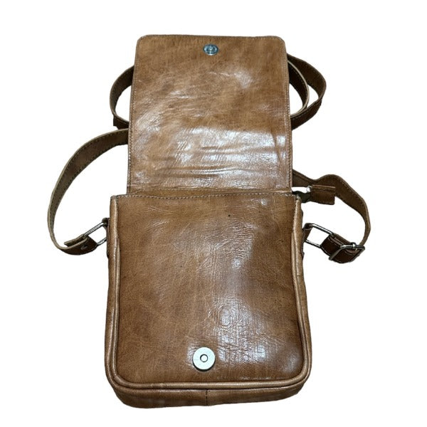 a brown leather purse with a button on it