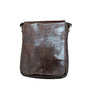 a brown leather purse on a white background