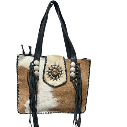 Bolso de piel con pelo natural.Bolso muy cómodo y elegante para mujer