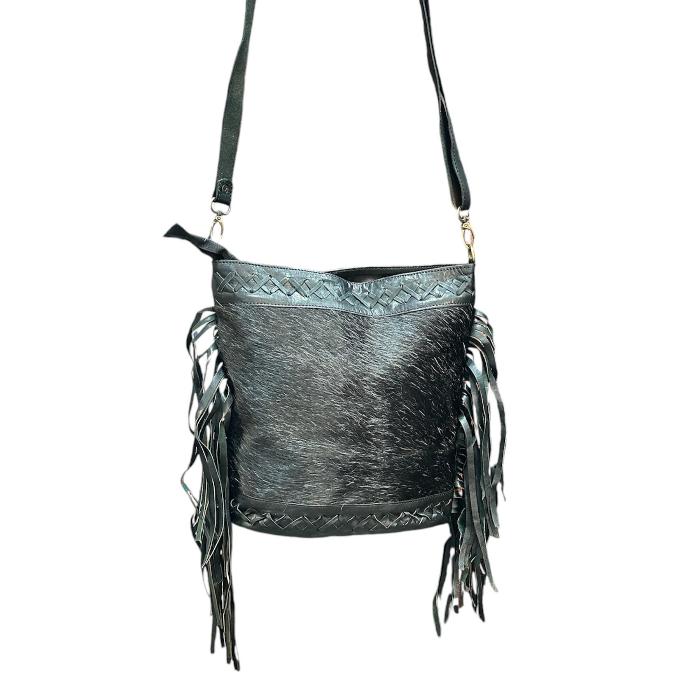 Bolso artesanal  de cuero con pelo