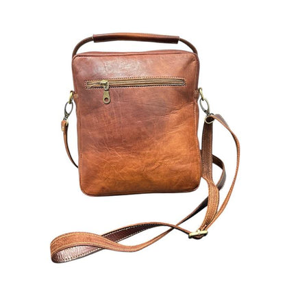 Natural leather travel backpack with zipper.