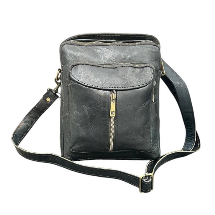 Natural leather travel backpack with zipper.