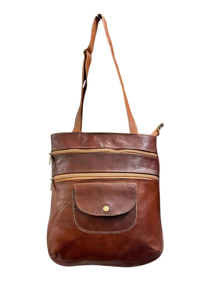 Handmade travel backpack with zipper made of natural leather.