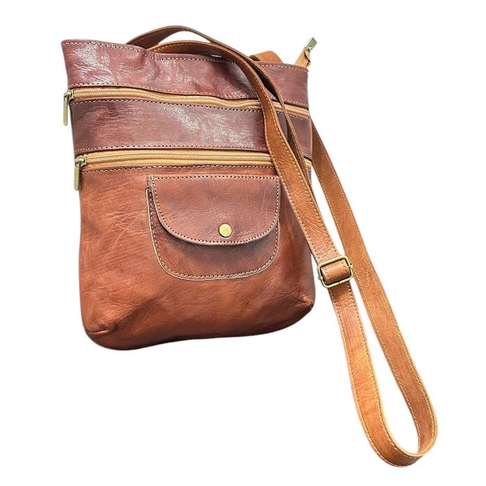 Handmade travel backpack with zipper made of natural leather.